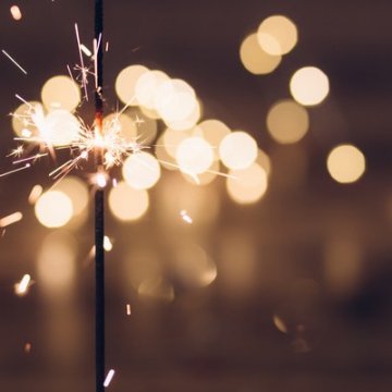 Sparkler with fireworks.