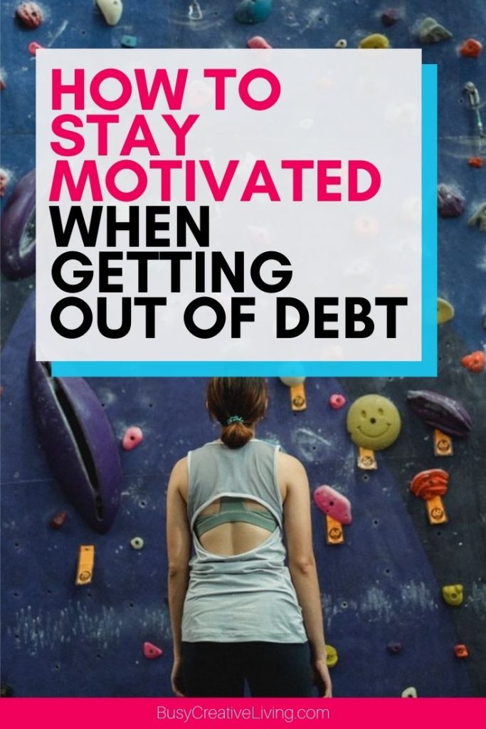 How to stay motivated when getting out of debt. Woman staring up at climbing wall